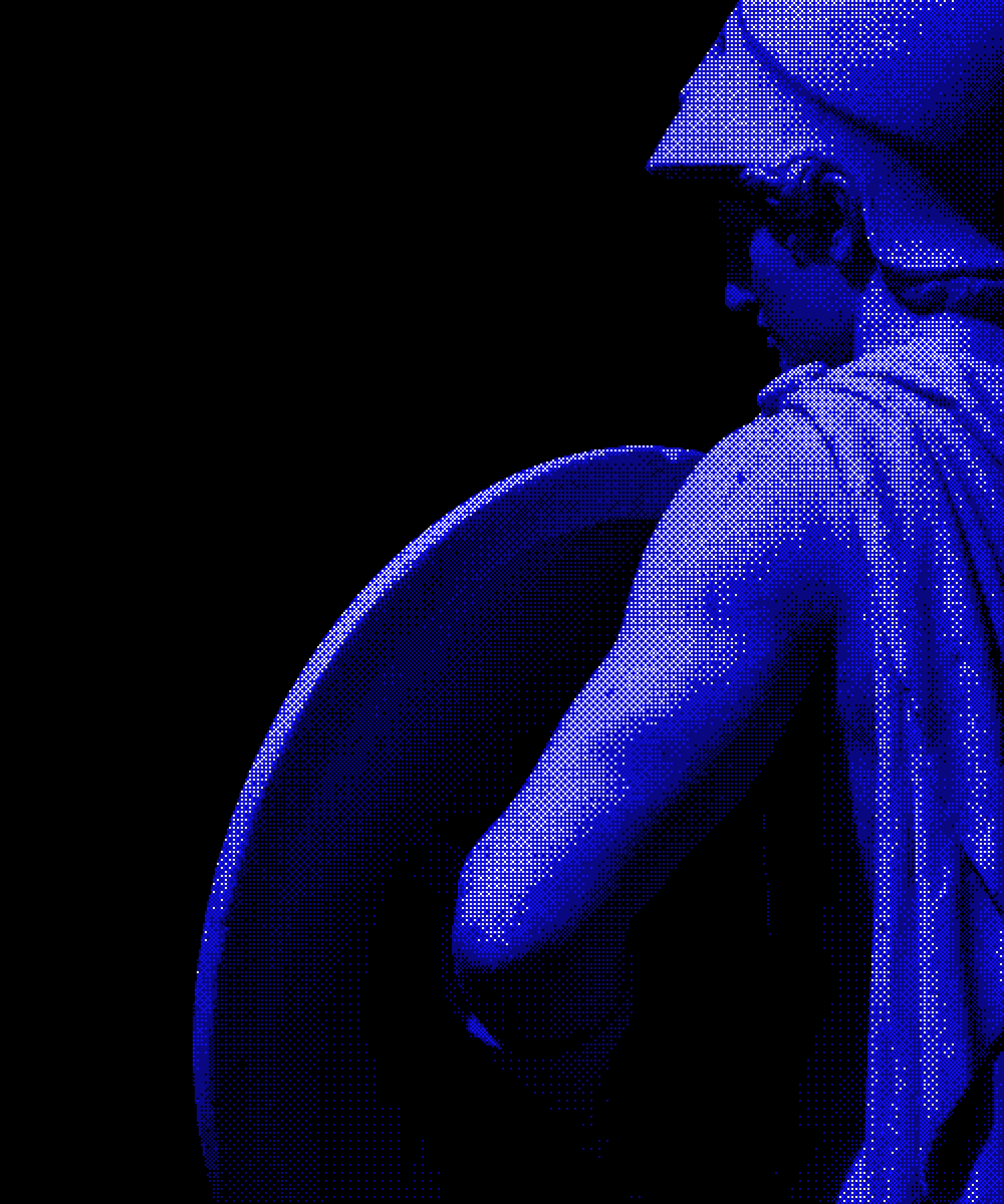 Blue stone statue of a warrior holding a shield